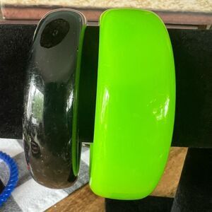 Black and neon green bracelets